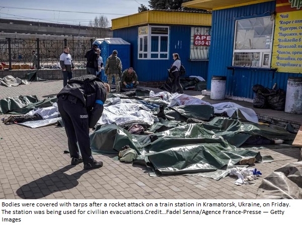 Dozens of civilians killed in rocket attack on train station in eastern Ukraine