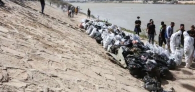 Iraqis clean up river as first green projects take root