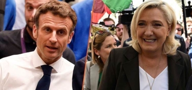 خلافات بين ماكرون ولوبن بشأن حظر الحجاب في فرنسا