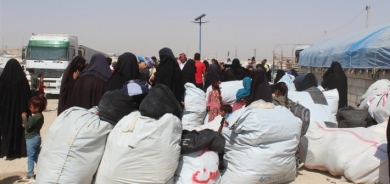 152 عائلة تعود من مخيم الهول إلى العراق