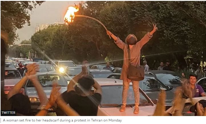Iran unrest: Women burn headscarves at anti-hijab protests