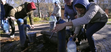 Kyiv residents 'get by' after Russian strikes cut water and power