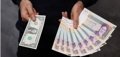 Iran's currency slides to record low as savers buy dollars