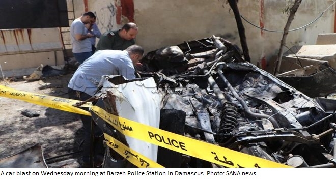 Car bombing near police station in Damascus wounds five officers