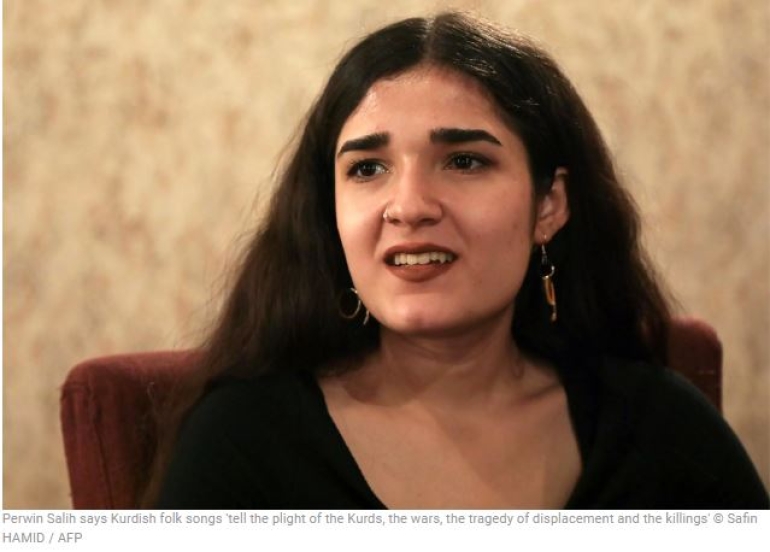 After IS and bombs, refugee sisters sing of Kurdish sorrow