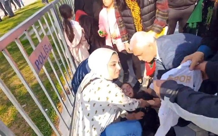 Security Forces Force Young Girl with Down Syndrome to Remove Kurdish Football Club Jersey at Newroz Celebration, Igniting Outcry