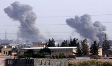 القذافي يتعهد بمواصلة القتال وطائرات حلف الاطلسي تقصف طرابلس