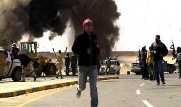 قتال عنيف مع محاولة المعارضين الليبيين الاطباق على القذافي