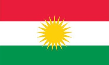 تبديل أعلام كردستان القديمة على المدارس بأخرى جديدة