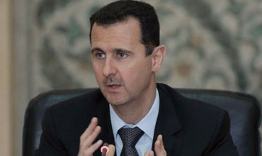 بشار الأسد معلنا 