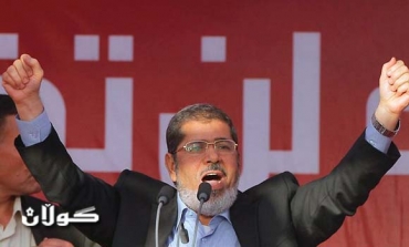 Egypt's President Mohamed Morsi takes a symbolic oath in Tahrir Square